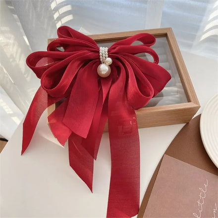 files/oversized_tulle_red_bow_hair_bow_tie_pink_loreta_melbourne-australian-boutique-4.jpg