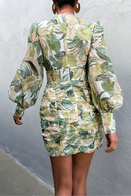 products/OurParadiseDressfeaturesaV-neckline_longpuffsleeveswithbuttonsonthecuffs_centre-frontbuttondetailingonthewaistband_loreta.jpg