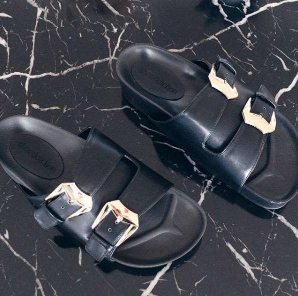 Black flats best sale with gold buckle